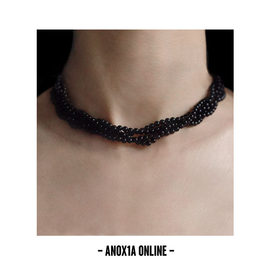 Radiate Bold Elegance with Our Natural Quad-Strand Black