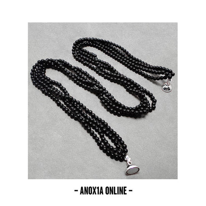 Radiate Bold Elegance with Our Natural Quad-Strand Black